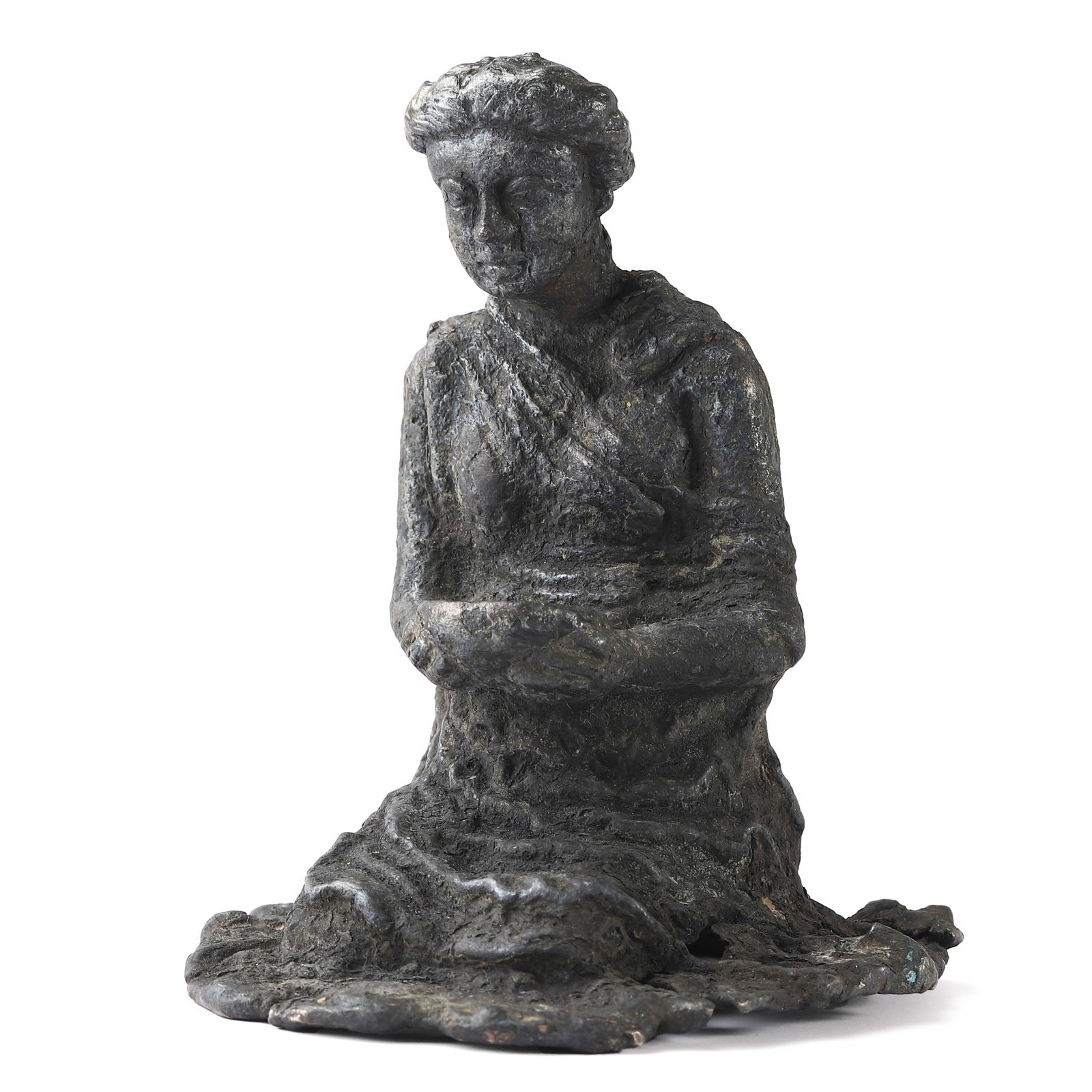 BRONZE SEATED FEMALE FIGURE: Height: 4 3/4 in (12 cm). This bronze seated female figure presents a serene and introspective pose, modeled with a textured surface that highlights the draped garment and the subtle contours of the