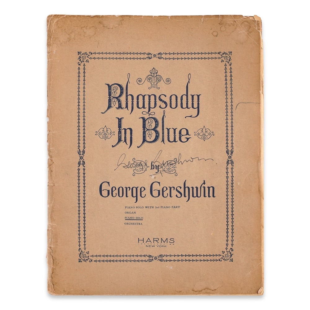 GEORGE GERSHWIN, SIGNED "RHAPSODY IN BLUE" SHEET MUSIC: 11 7/8 x 9 in (30.3 x 23 cm) Provenance and Authentication: This collectible has undergone a rigorous forensic evaluation. The signatures were carefully analyzed across multiple criteria, including