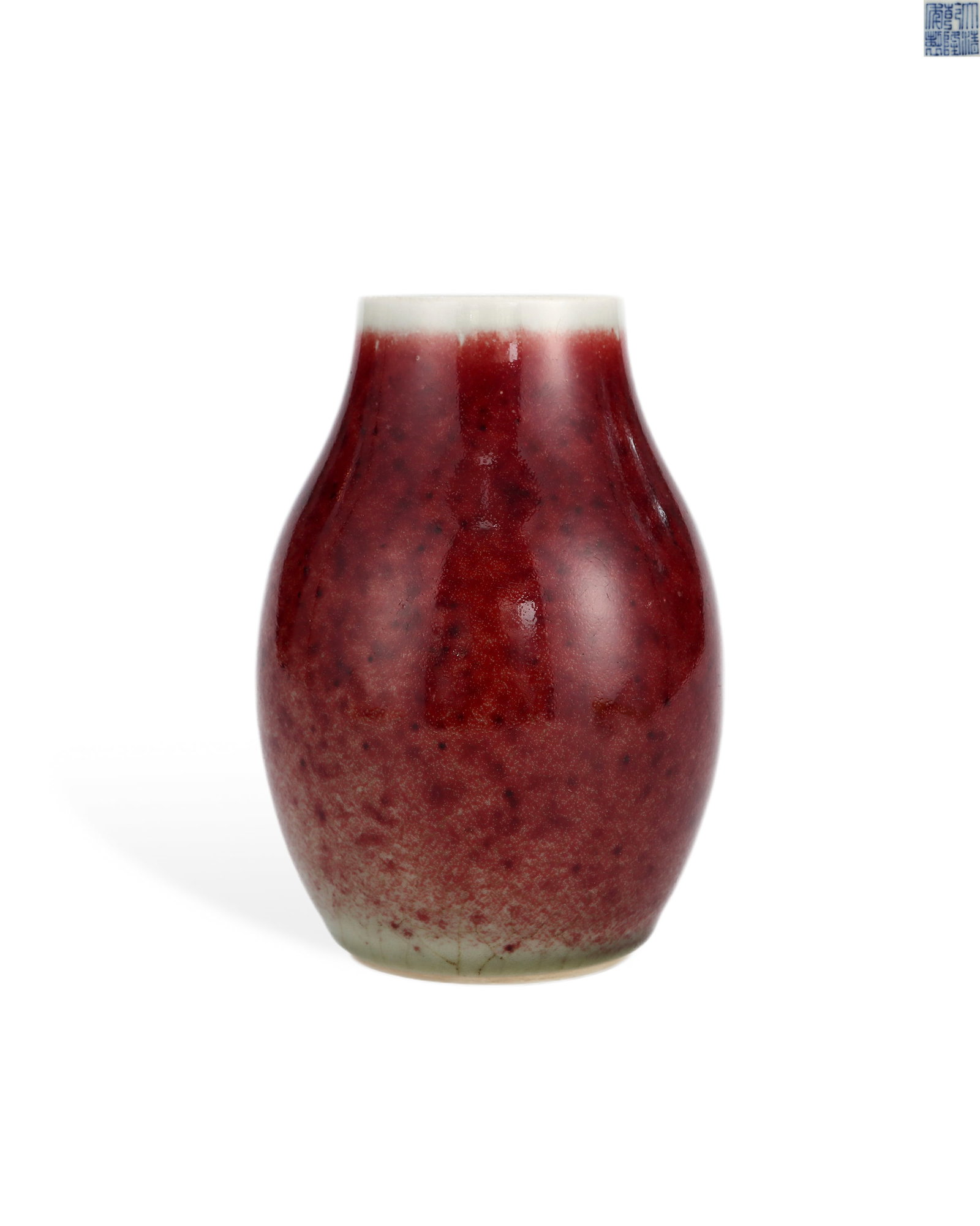 A RED GLAZED GARLIC-HEADED BOTTLE FROM THE LONG KILN OF THE QING DYNASTY: L: 10.3cm H: 14.2cm
