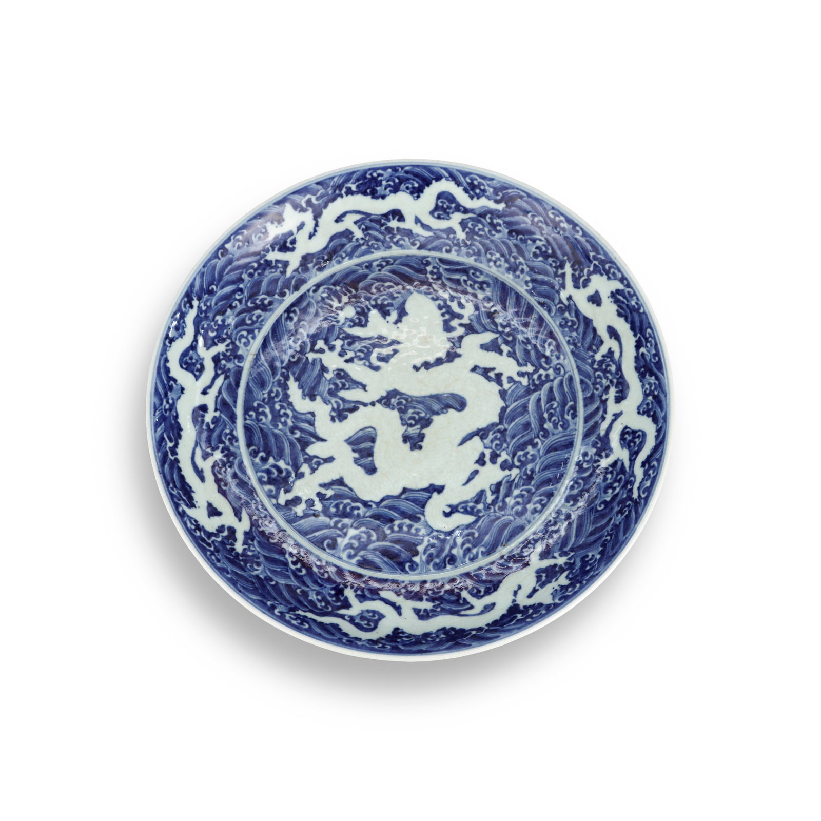 MING YONGLE BLUE AND WHITE PLATE WITH HIDDEN DRAGON PATTERN ENGRAVED IN THE BLANK SPACE: D: 45.7cm