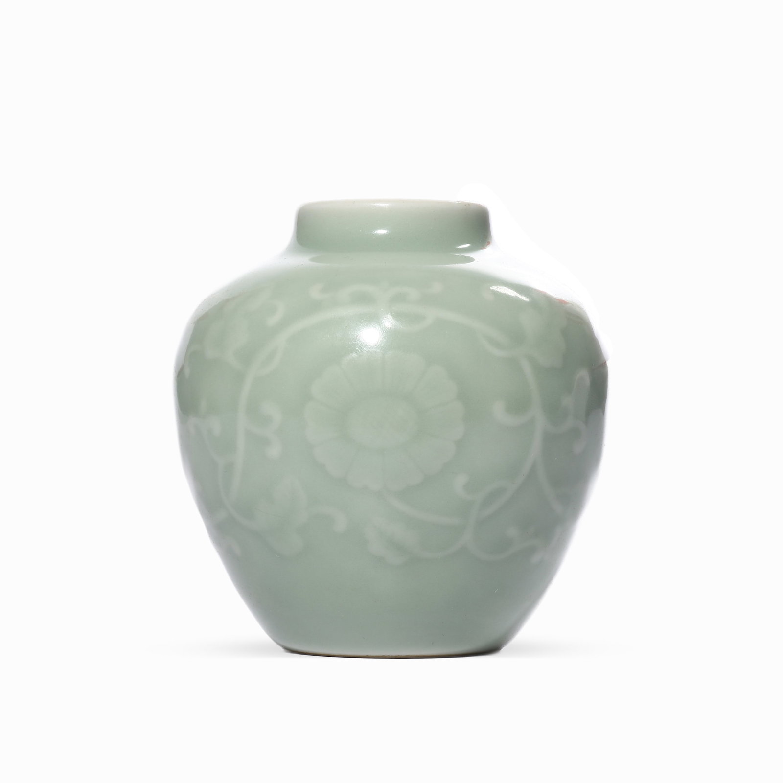A SMALL JAR OF QING POWDER BLUE GLAZE WITH ENTWINED FLORAL PATTERNS: H: 10cm