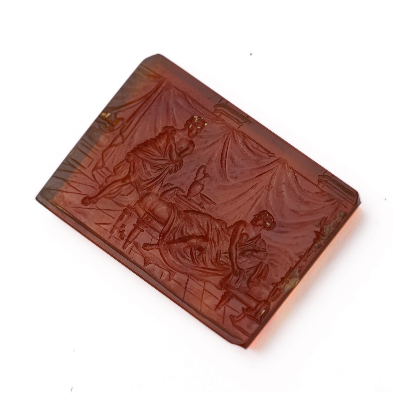 A RECTANGULAR AMBER INTAGLIO PLAQUE WITH A SCENE OF DIDO AND AENEAS (1 of 4)