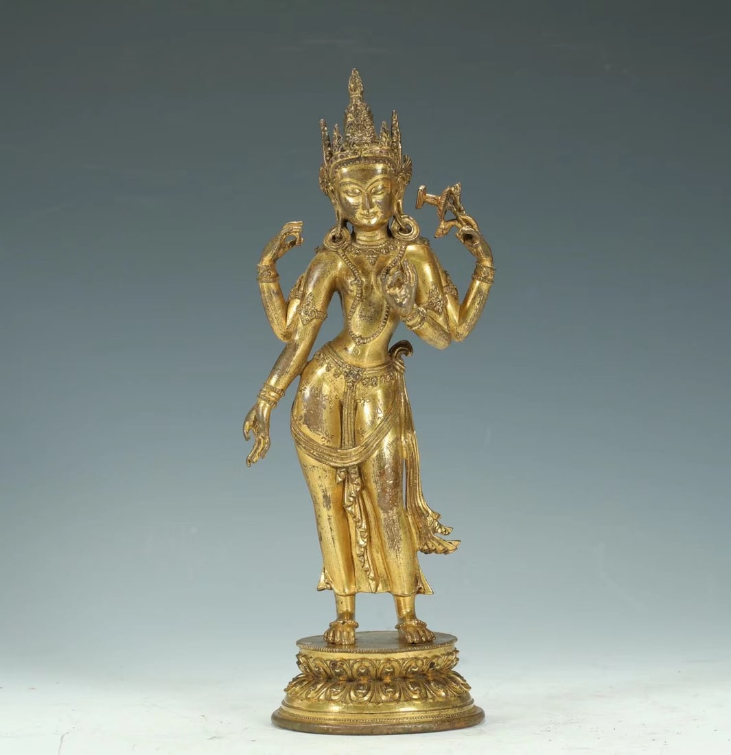 GILDED FOUR-ARMED BODHISATTVA FROM THE MING DYNASTY: H:20CM