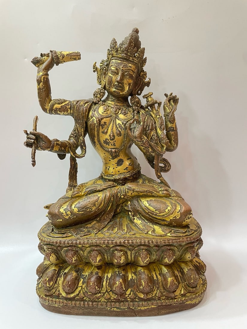 GILDED FOUR-ARMED BODHISATTVA FROM THE MING DYNASTY: H:33CM L:20CM
