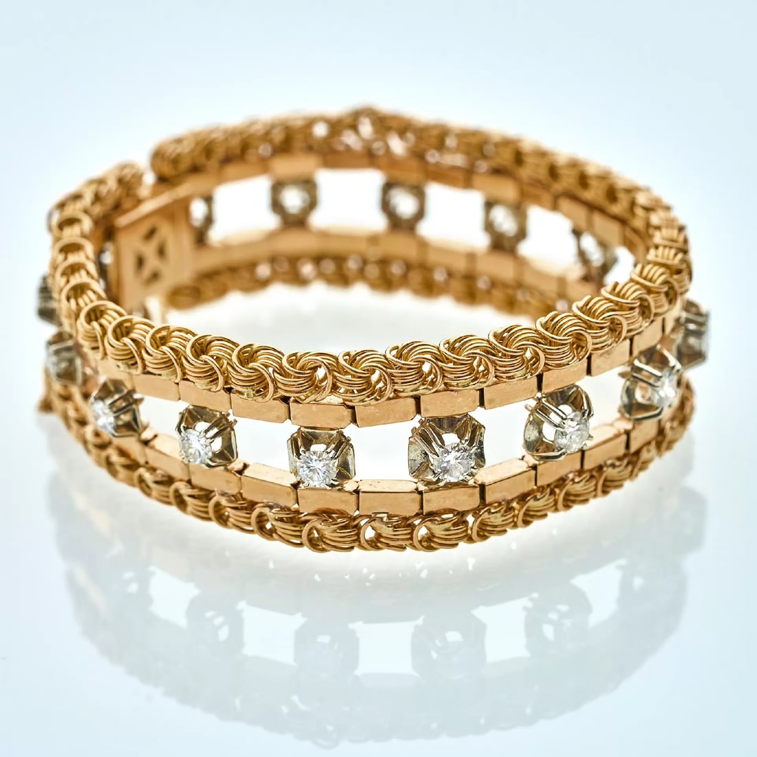French Retro Period 18K Gold Diamond-Set Antique Bracelet: Inner Diameter:58 mm Wt:45.4g Crafted in 18K gold with a rich warm golden hue, this bracelet adopts the signature knot-and-twisted-chain technique of the Retro period, delivering a tactile, textured s