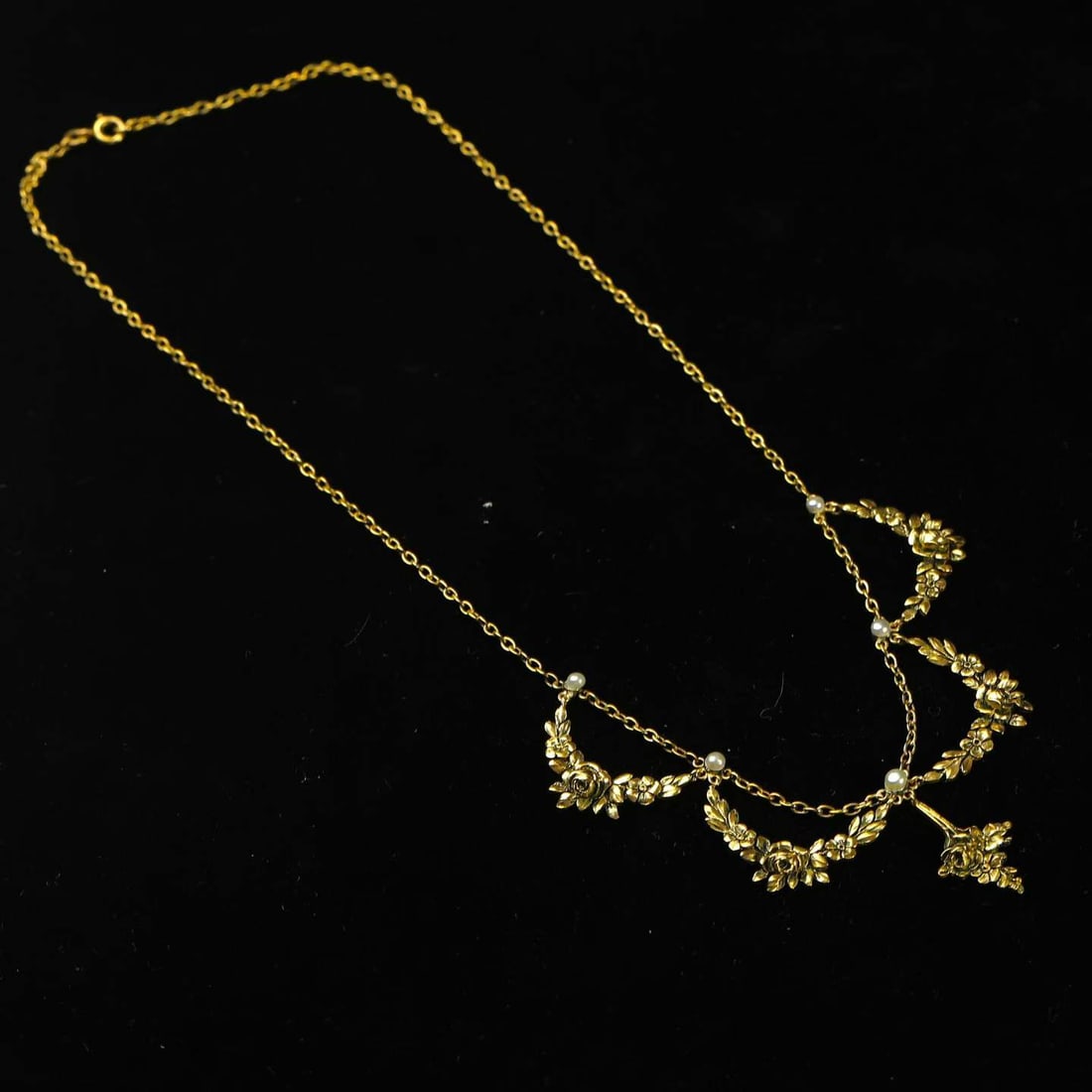 Art Nouveau Period (1880-1920) French Rose-Garland Pearl Festoon 18K Gold Necklet: Chain Length:42.5cm Wt:14.3g Entirely hand-crafted in 18K gold, modelled in high-relief scrolling floral motifs. The graceful contours of the gold blossoms evoke a garden glistening with morning dew, 