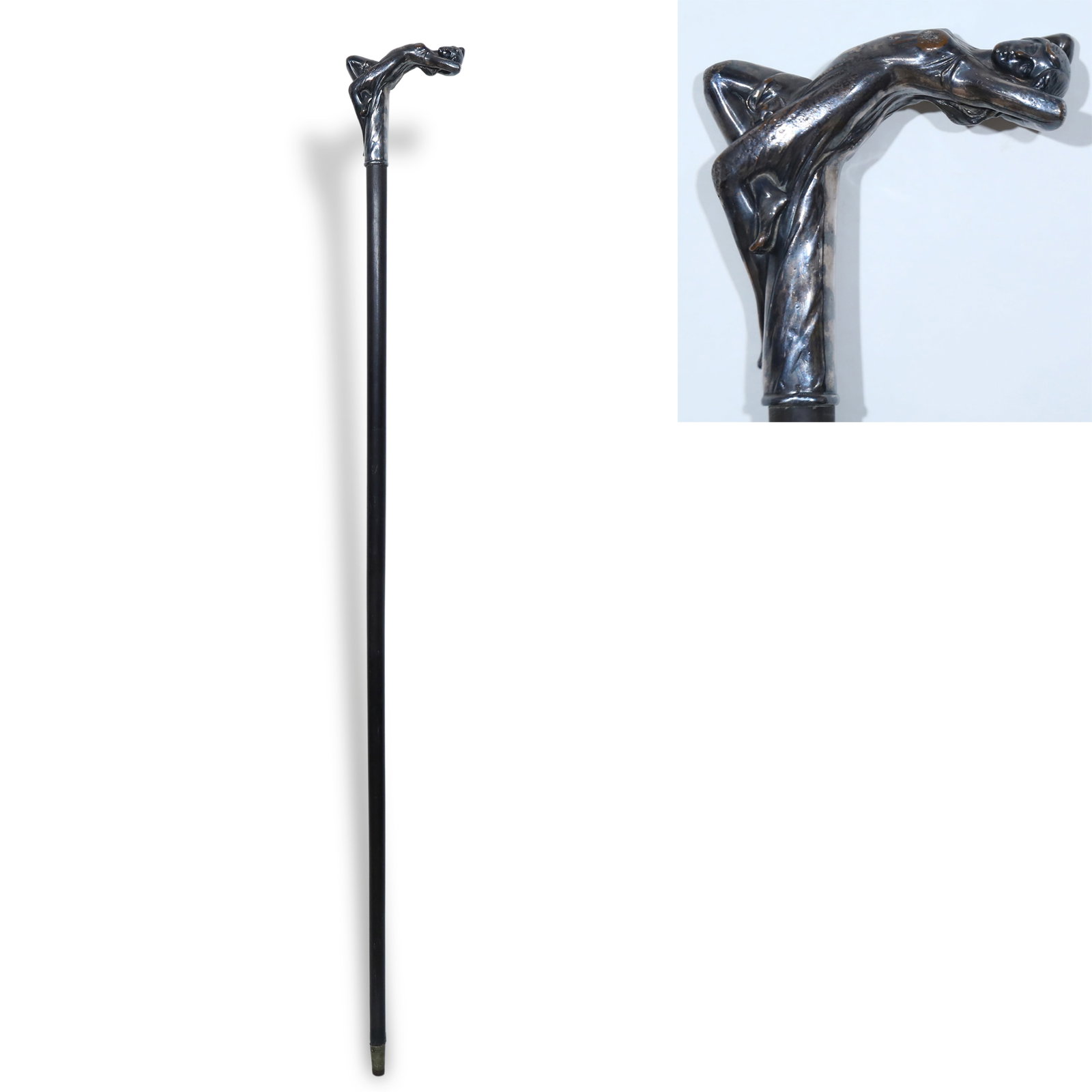 c.1900, Art Nouveau Walking Cane: H:93cm Period: 1900Style: Art Nouveau StyleMaterial: Silver-plated, Red SandalwoodOrigin: GermanyDescriptionThis German Art Nouveau walking cane dates to 1900. Its handle is crafted as a silver-plated