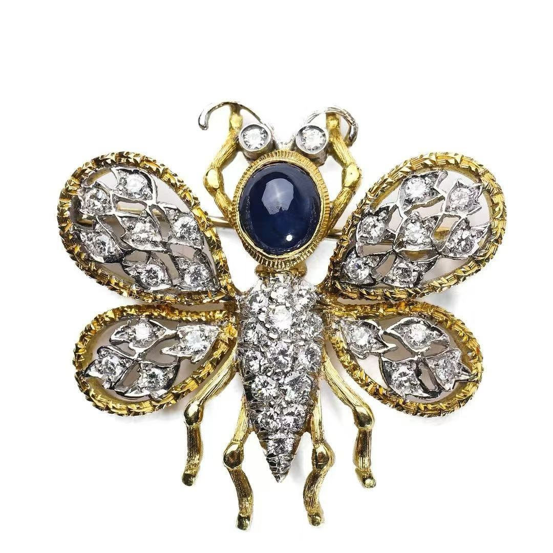 Italian Buccellati-Craft Two-Tone Gold Bee Brooch, Hand-Fabricated in Solid 18K Two-Tone Gold: 3.4*3.4cm Wt:11g Executed in Buccellati's classic lace-chased gold technique. The body is set with a 2-ct sapphire and 1-ct diamond. Highly artistic in design, it displays consummate craftsmanship and