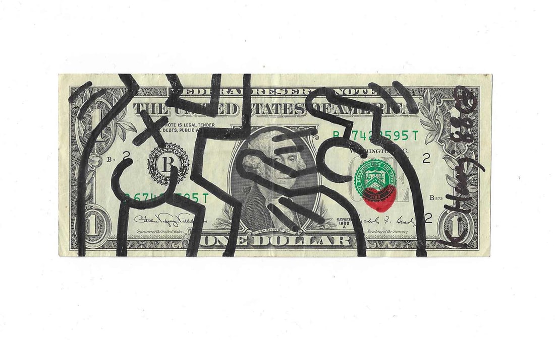 KEITH HARING (1958-1990), ATTRIBUTED TO, MARKER PEN ON ONE DOLLAR: Image Size: 6.14 by 2.61 inches (15.6 by 6.6cm) Keith Haring (1958-1990) was a trailblazing American artist celebrated for his iconic and accessible visual language. His distinctive style, characteriz
