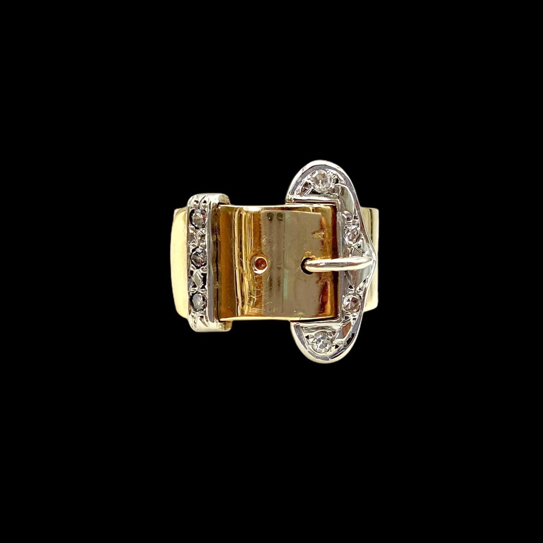 Vintage Gold Diamond Buckle Ring: 14K. Wide band with diamond decorated buckle and slide detail. Band measures 10 mm wide all the way around. Buckle 18mm at widest point. Ring size 7 3/4. Weight 13.4G