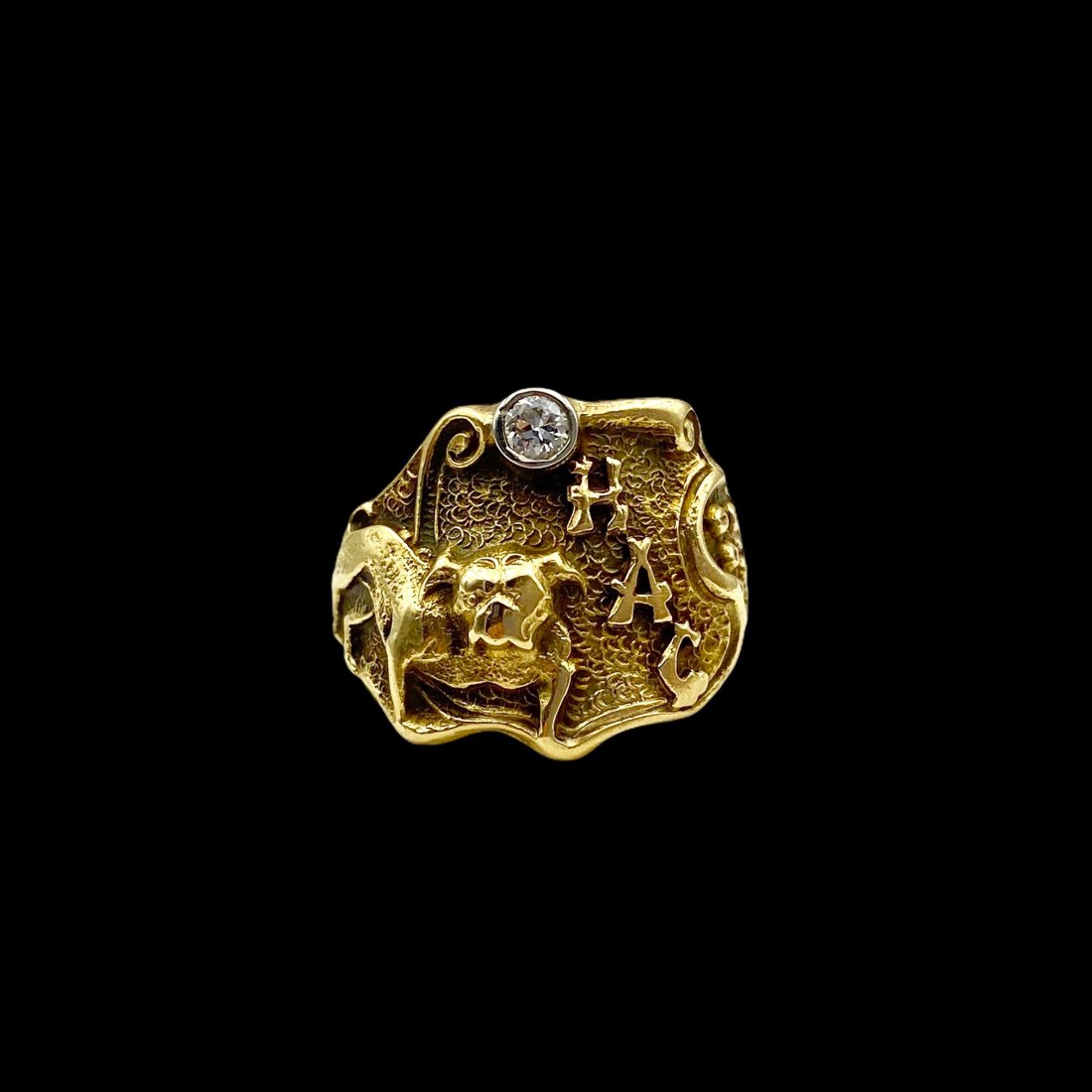 Vintage Gold Diamond University Bulldog Ring: 14K. 1930s-40s class ring with apx. .15ct transitional cut diamond. Exquisite details throughout with scrolls and textures, raised initials hilariously spell out H A G. Ring size 8 3/4. Weight 10.2g. 
