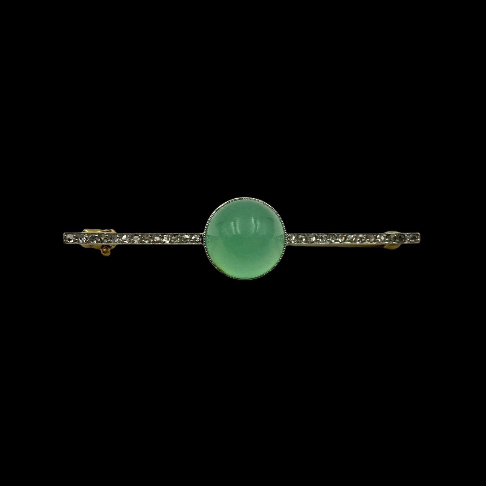 Edwardian Gold Chrysoprase Diamond Pin: 14K Centered with a large 11mm by 9mm Chrysoprase Cabochon and rose cut diamonds the length of each side. 2 L. Weight 4.6g. In excellent condition.