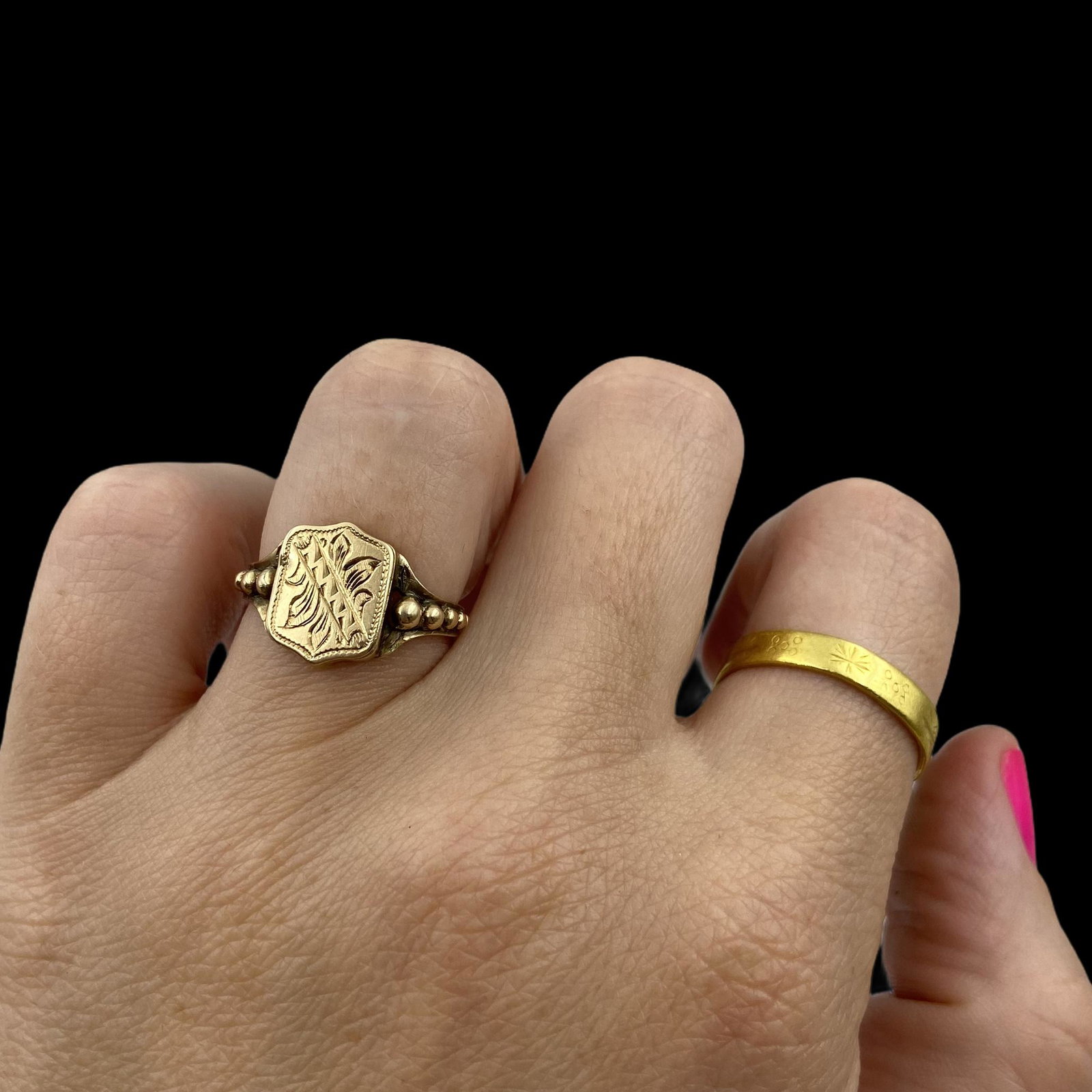 14K Victorian Locket Ring: Hand chased decoration on hinged panel which opens to reveal a locket. Measures 12mm north to south and 9mm east to west. Ring size 6. Weight 2.6g. Excellent condition.