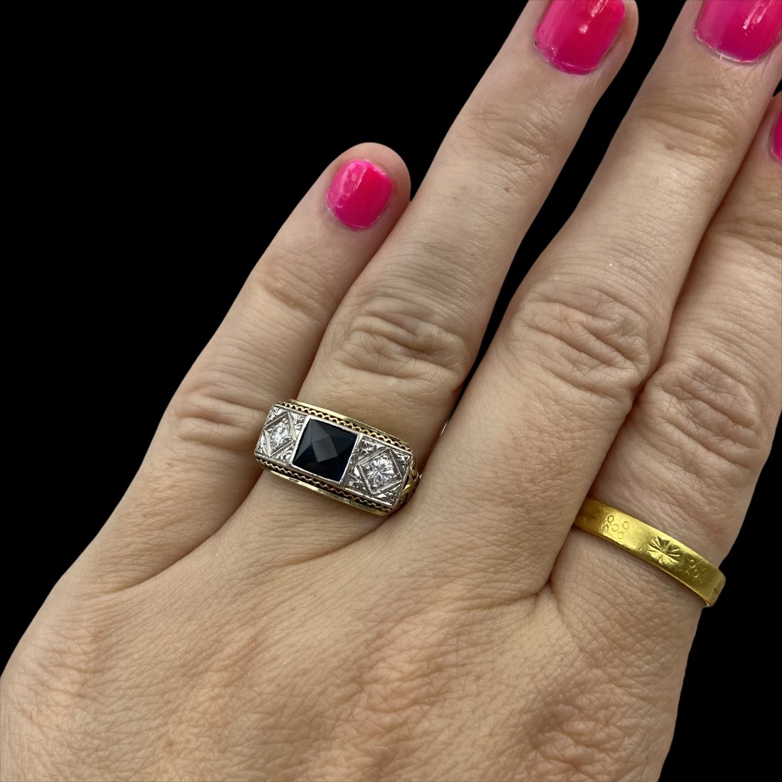 Platinum and gold Edwardian Diamond Sapphire Ring: Beautifully hand carved Edwardian ring mounting in 14k and Platinum. Set with Apx .40 CTW diamonds and the original fancy cut synthetic Sapphire center. Ring size 6 3/4. Weight 4.5g. Excellent conditi