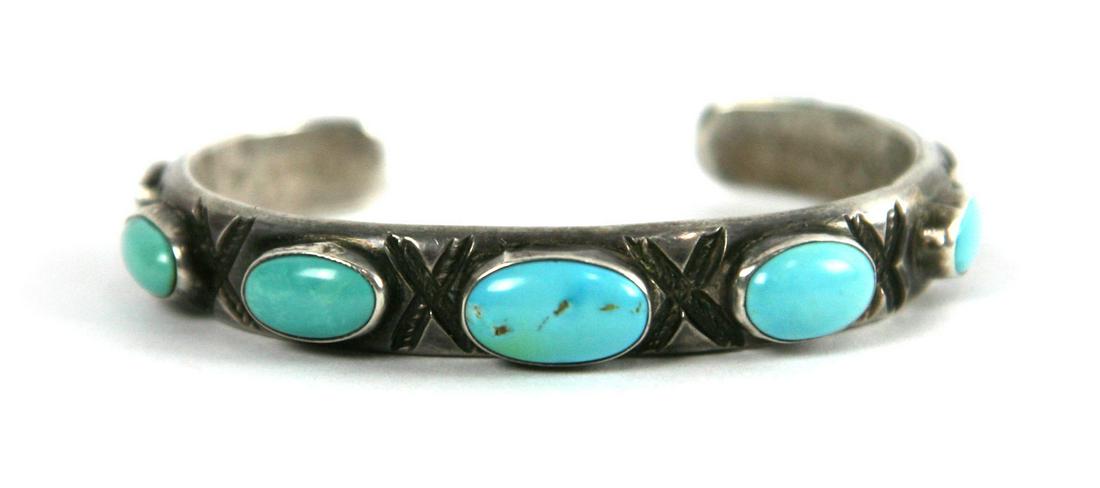 Navajo Turquoise and Silver Bracelet c. 1940-50s: 44.2g, 0.5" bandwidth, size 6.5 to include a gap of 1". Acquired from a private collection out of Oregon.