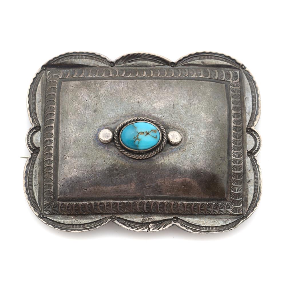 Navajo Turquoise and Silver Pin c. 1920s, 1.75" x 2.25": 25g, 1.75" x 2.25". Acquired from the collection of Hans Schaedela of Chicago, who collected during the 1920-40s. He donated much of his collection to the Field Museum in 1976.