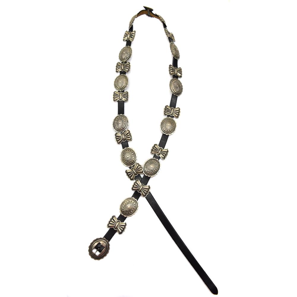 Navajo Silver Concho Belt c. 1940s, 47.5" length: 209.5g, 47.5" total length. Fits a waist size of up to 47". The buckle measures 1.375" x 1.625", and the conchos measure 1.25" x 1.5", each. Acquired from a private collection in Missouri.