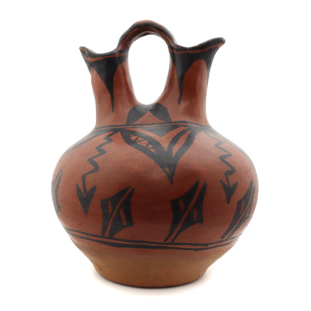 San Ildefonso Black-on-Red Wedding Vase, c. 1890s: Classic, old San Ildefonso wedding vase. Red body with black decorations of leaves and arrows. Acquired from a private collection in New Mexico. The wedding vase symbolizes the sanctity of marriage in