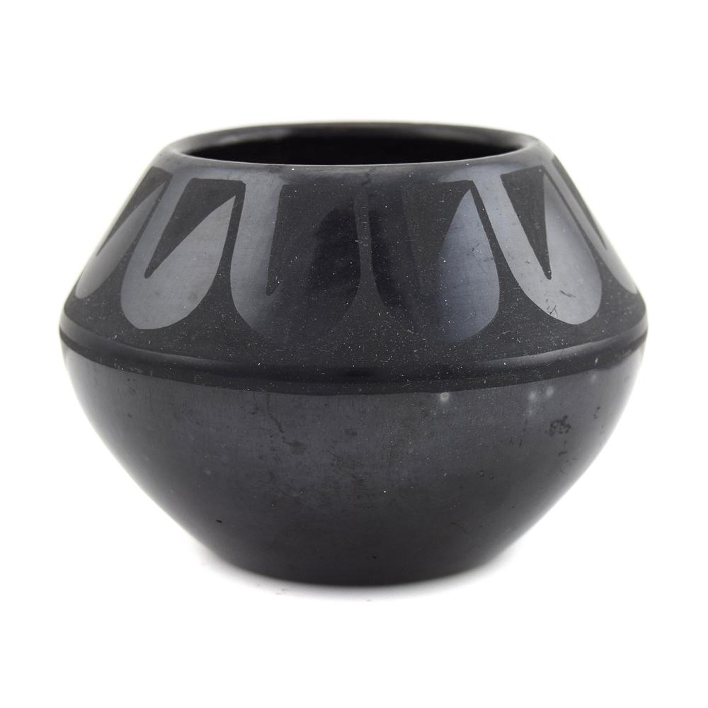 Desideria Montoya Sanchez- San Ildefonso Black on Black: Desideria Montoya Sanchez (1889-1982) - San Ildefonso Black on Black Jar c. 1940s. Desideria Montoya Sanchez was the older sister of Maria Martinez (1887-1980). This jar has a beautiful black polished