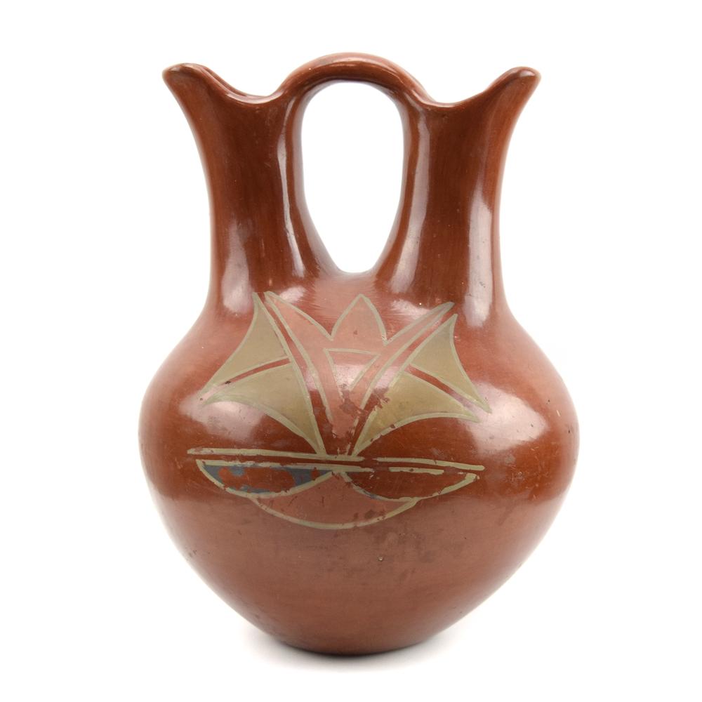 Large San Juan Redware Wedding Vase c. 1940s: Red burnished surface with polychrome design on the body of the vase. Acquired from a private collection in Arizona. The wedding vase symbolizes the sanctity of marriage in the ceremony. One spout on 