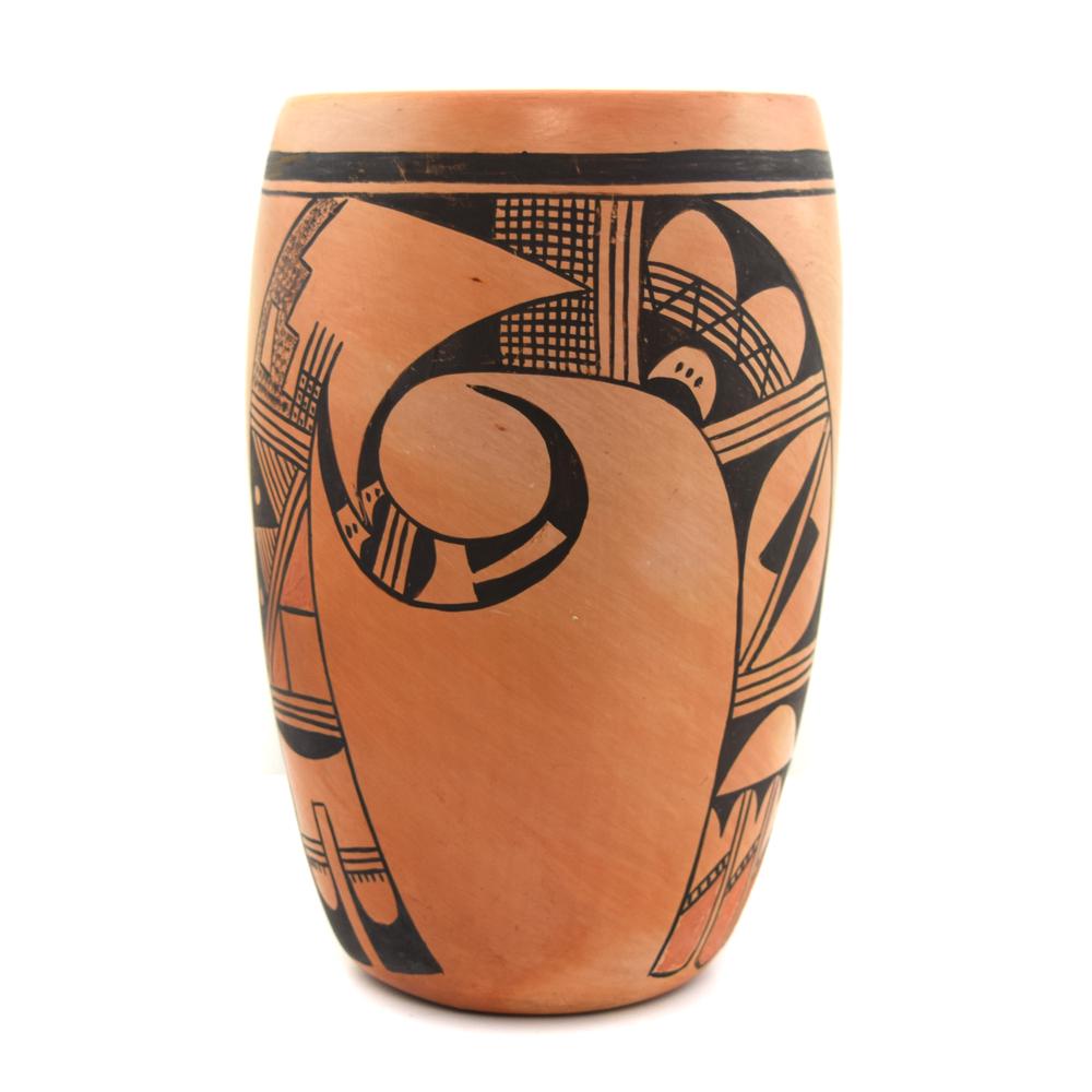 Violet Huma (1930-1982) - Hopi Vase c. 1960-70s: Violet Huma was born on First Mesa at Hopi. She made pottery from the 1960s through the 1970s. This vase is decorated with black slip using traditional Hopi Bird designs. There is a spirit break in th