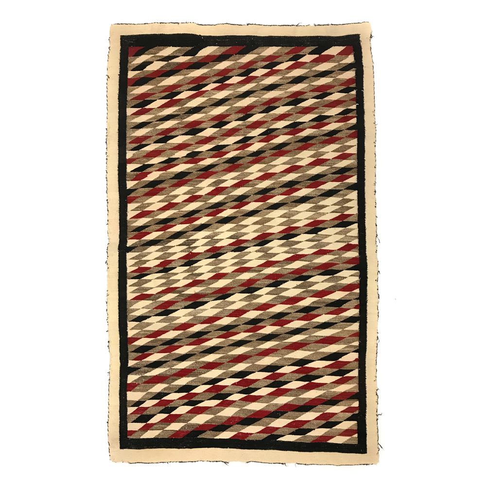 Navajo Ganado Rug c. 1920-30s, 60.5" x 37.5": Acquired from a private family collection. This item was purchased at the White Dove Trading Post in Big Bear, California, in the late 1950s. The trading post owner was Mary Rose Stone who was an actr