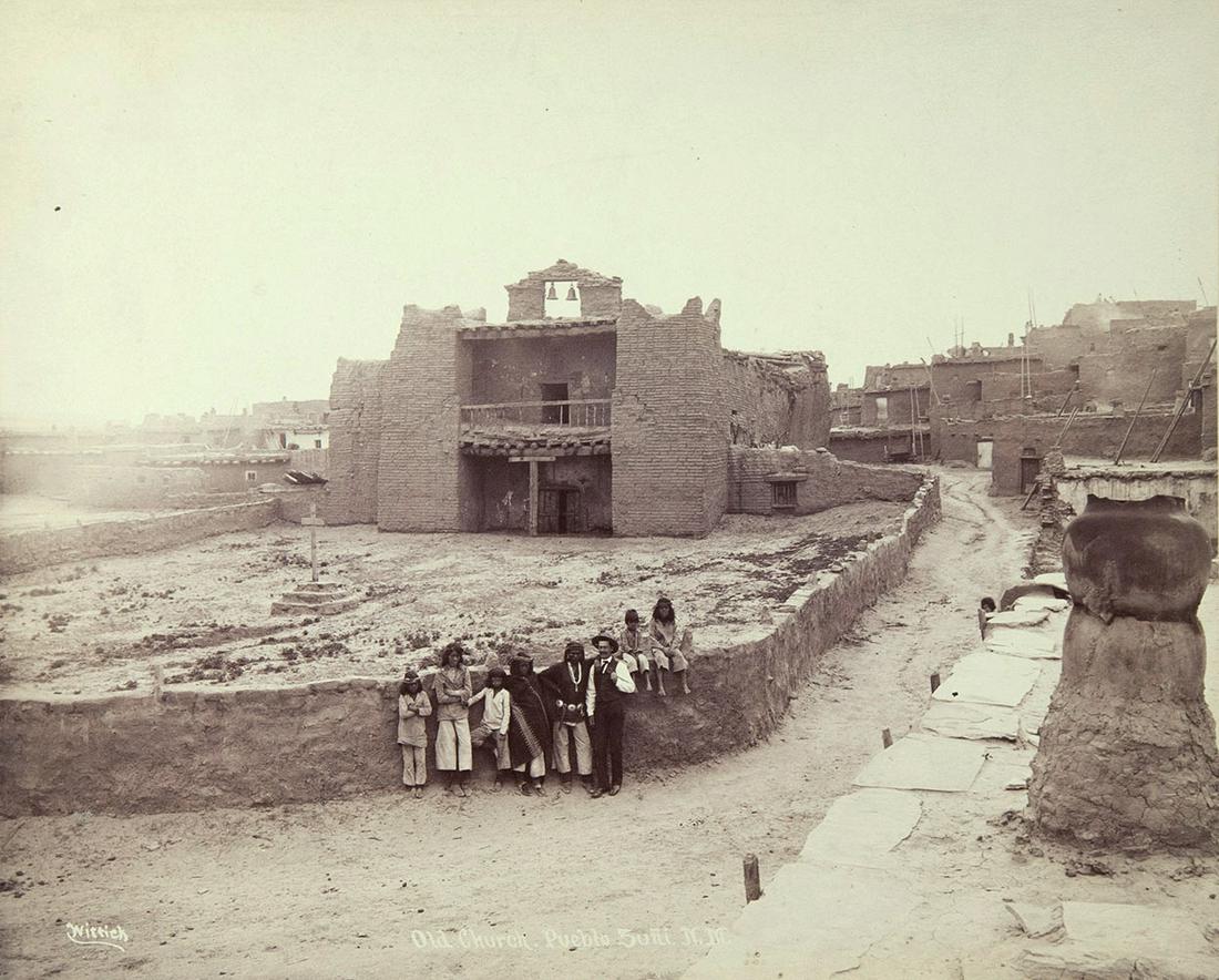 Ben Wittick (1845-1903) - Old Church, Pueblo Zuni, NM: c. 1885. 7.75" x 9.5" albumen print. 17.25" x 18.25" framed. Professionally framed with archival materials. Framed behind glass. Images of the photograph on its supporting board are also shown (unfram
