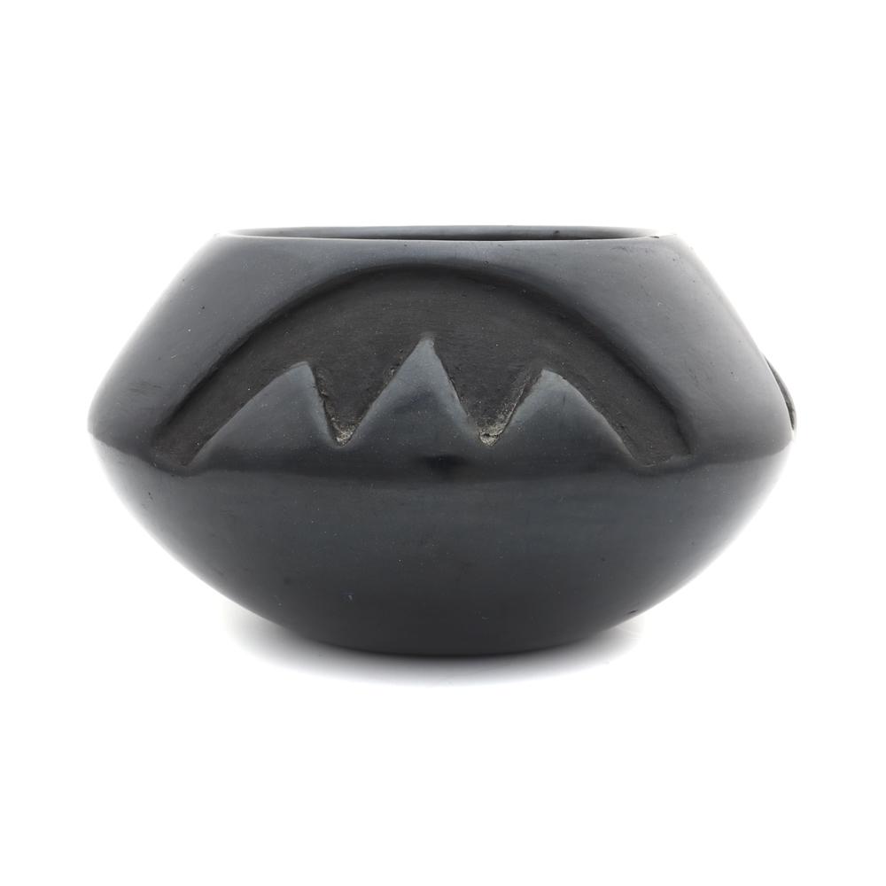 Blue Corn - San Ildefonso Black Carved Jar: Blue Corn (Crucita Gonzales Calabaza) (1921-1999) - San Ildefonso Black Carved Jar c. 1960-70s, 3.125" x 5.5". Nicely carved black jar by the famous Blue Corn of Santa Clara pueblo. This pottery is in