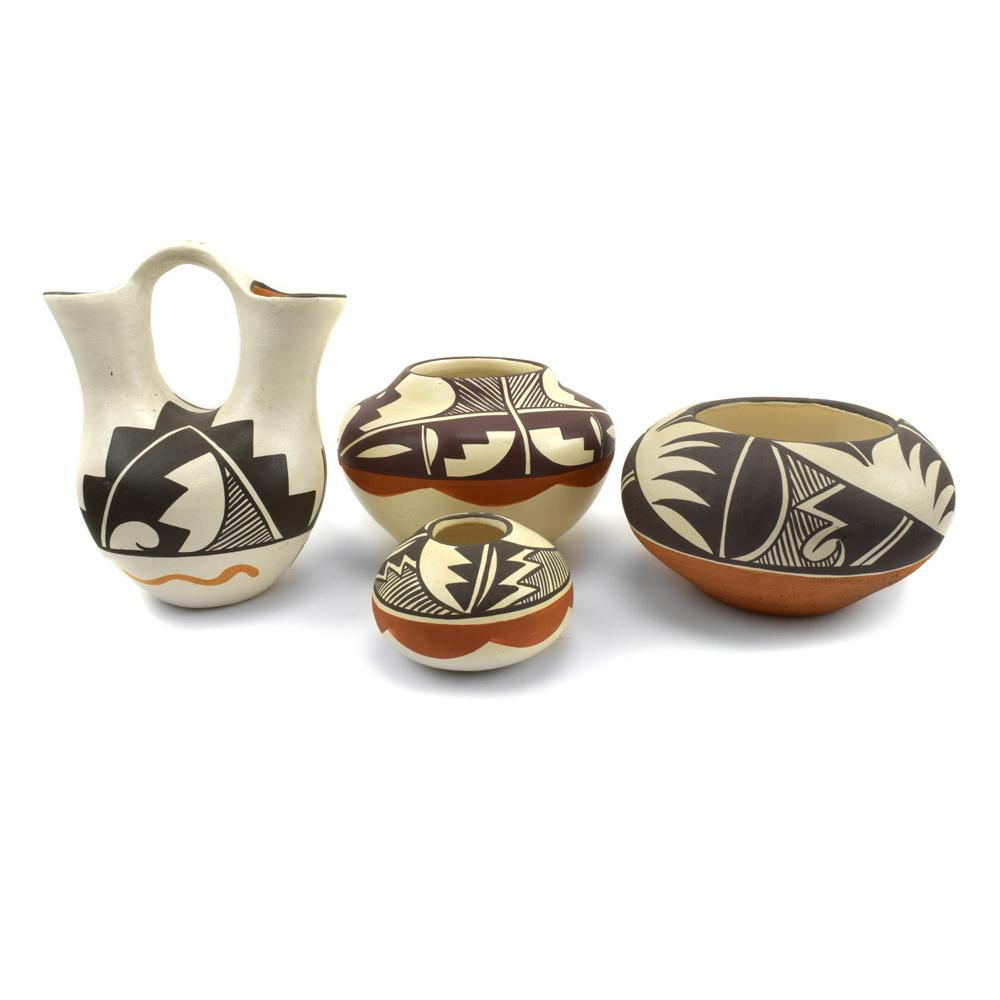 Stella Teller Group of 4 Isleta Polychrome Pots: This is a Stella Teller (b. 1929) - Group of 4 Isleta Polychrome Pots c. 1980s. Very nice collection of small Stella Teller pieces. Three jars and one wedding vase. All are decorated with well-execute