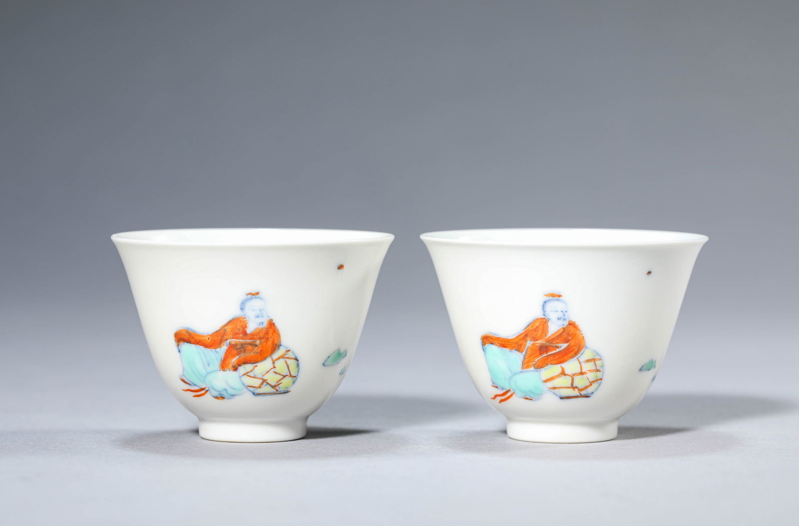 A Pair of Porcelain Doucai Figure Cups: A Pair of Porcelain Doucai Figure Cups Wide: 6cm High: 4.5cm