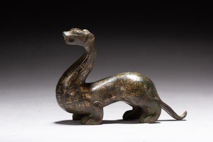 Gold and Silver Inlaid Carved Beast Ornament