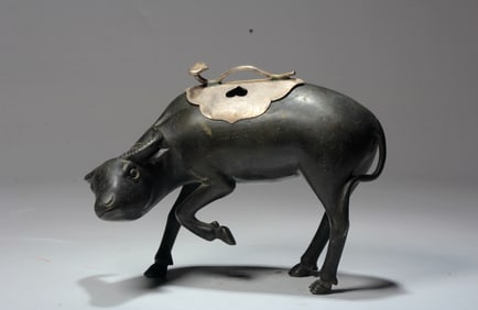 A BRONZE OX CENSER