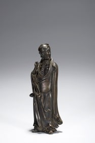 A BRONZE FIGURE OF DONG FANGSHUO