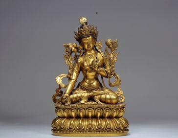 A GILT BRONZE FIGURE OF TARA