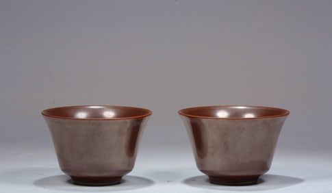 A PAIR OF BROWN-GLAZED  CUPS