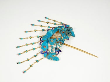 A GILT BRONZE HAIR PIN