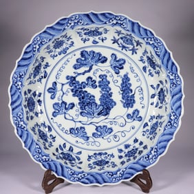 A BLUE AND WHITE 'GRAPES AND FLORAL'DISH