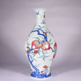 A BLUE AND WHITE FAMILLE ROSE 'BATS'OLIVE VASE