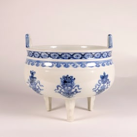 A BLUE AND WHITE TRIPOD CENSER BURNER