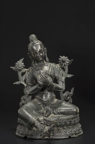 A BRONZE FIGURE OF TARA
