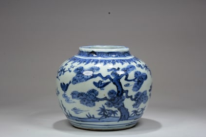 A BLUE AND WHITE LOBED JAR