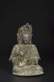 A BRONZE FIGURE OF GUANYIN