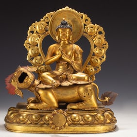 Gilt Bronze Sakyamuni and Beast Figure