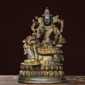 Gilt Bronze Tara and Beast Figure