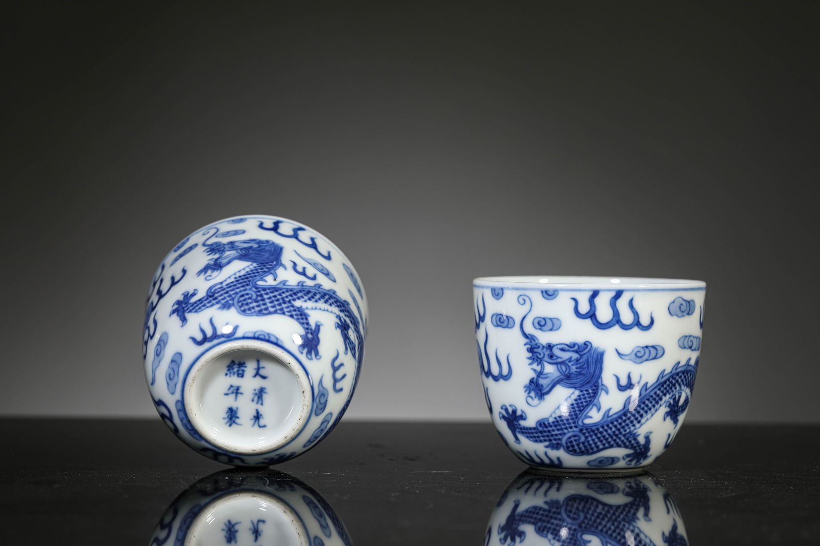 A Pair of Blue and White Dragon Cups: A Pair of Blue and White Dragon Cups (6.1 x 5.1cm)