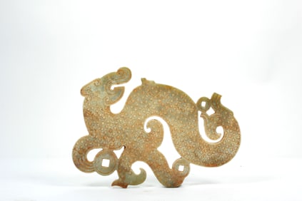 A JADE DRAGON SHAPE HUANG