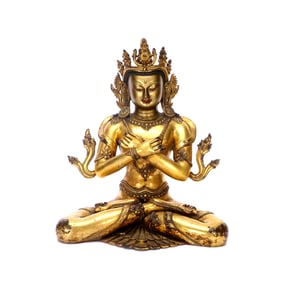 A GILT BRONZE FIGURE OF BUDDA
