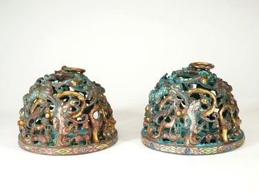A PAIR OF COPPER WITH SILVER AND GOLD 'DRAGON AND PHOENIX'PAPER WEIGHT