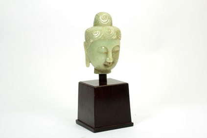 A JADE BUDDA HEAD