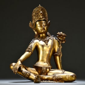 A GILT BRONZE FIGURE OF MAHA-PRATISARAH